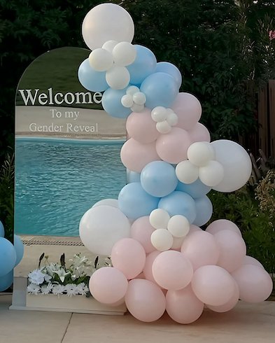 Mirror stand with Balloon arch and printed phrase