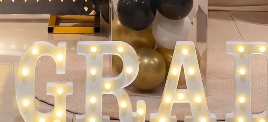 Illuminated GRAD letters