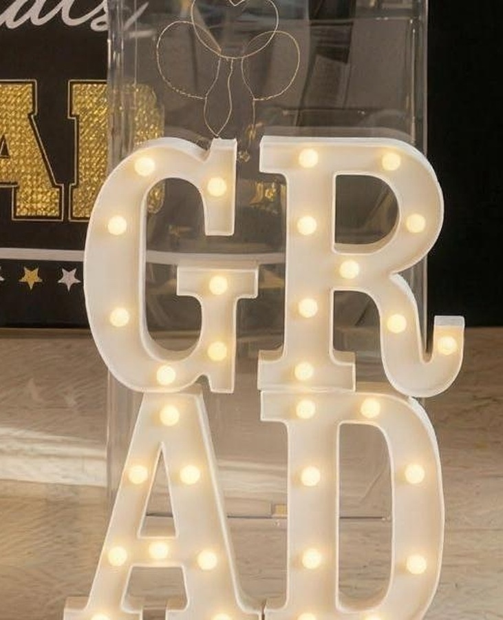 Illuminated GRAD letters